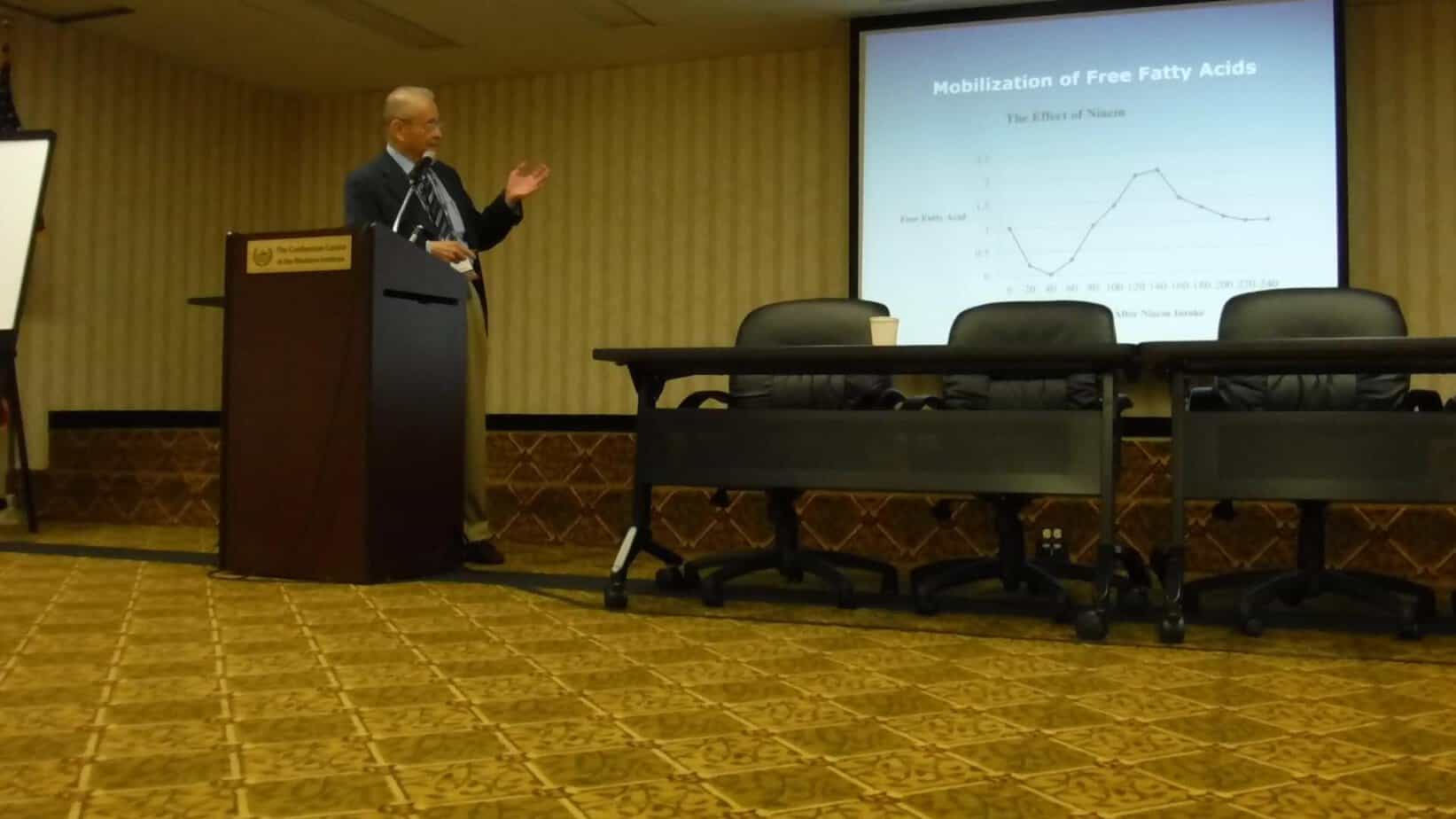 Dr. David E. Root lecturing on detoxification concepts